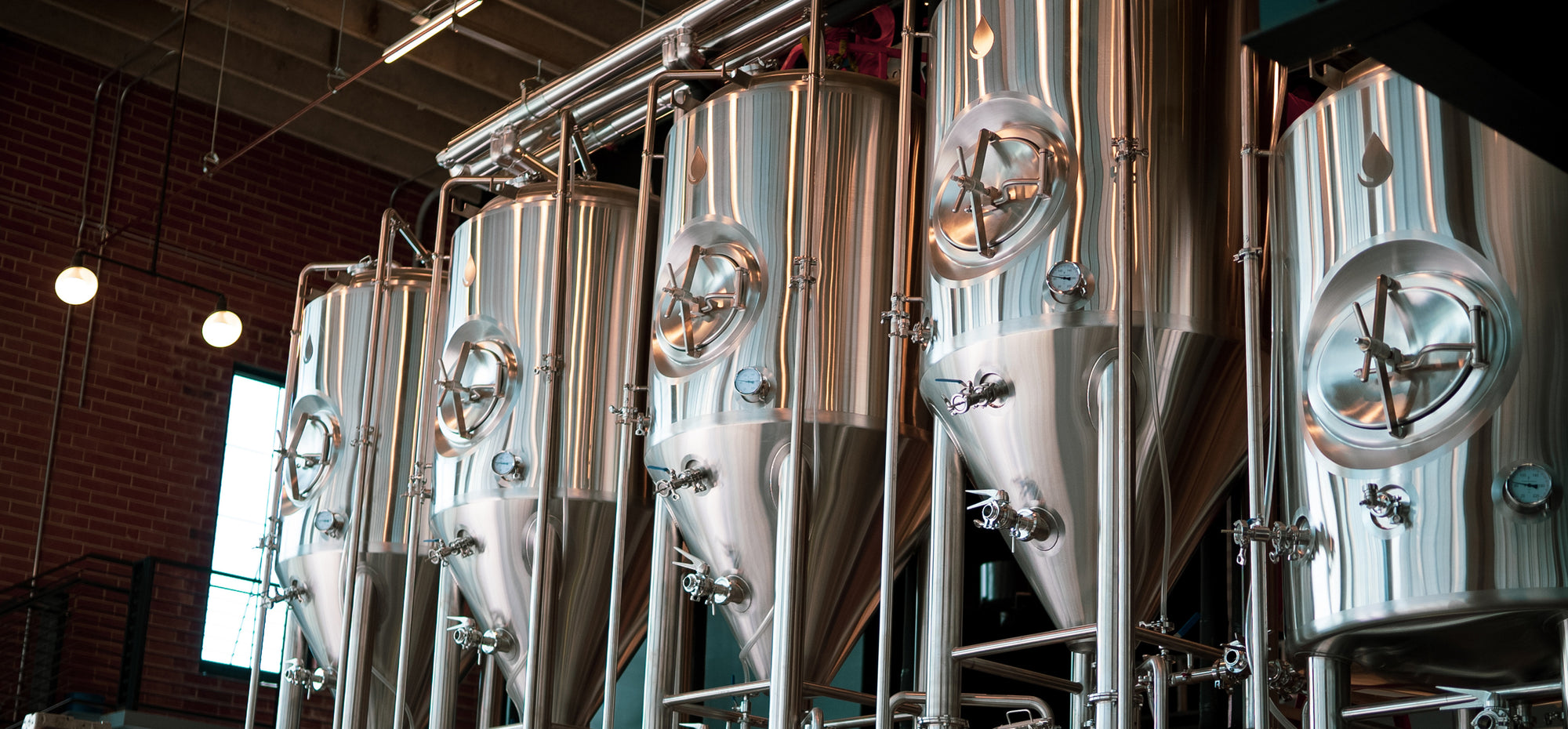 See DBT Parts in action. This array of fermenting tanks utilizes many of our parts of fermenter like 1.5" Tri-clamp temperature gauges, tri-clamp butterfly valves, 1.5" tc perlick valves, and manway gaskets. Shop more commercial brewing equipment and cellar hardware.